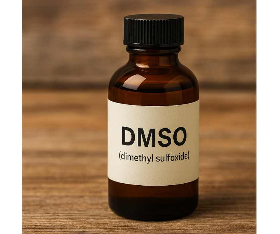Brown amber glass bottle labeled “DMSO (dimethyl sulfoxide)” on a wooden surface, symbolizing purity and pharmaceutical-grade quality for safe therapeutic use.