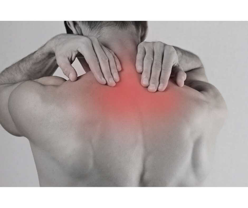 Person holding upper back and neck with highlighted red inflammation, representing muscle tension and chronic pain.